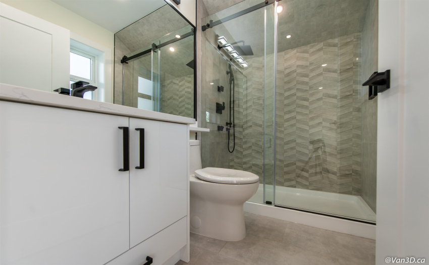 High end finishings, stone countertops, and black hardware accents.