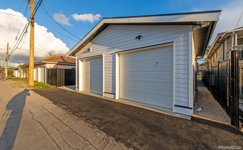Rear carport plus one garage parking.