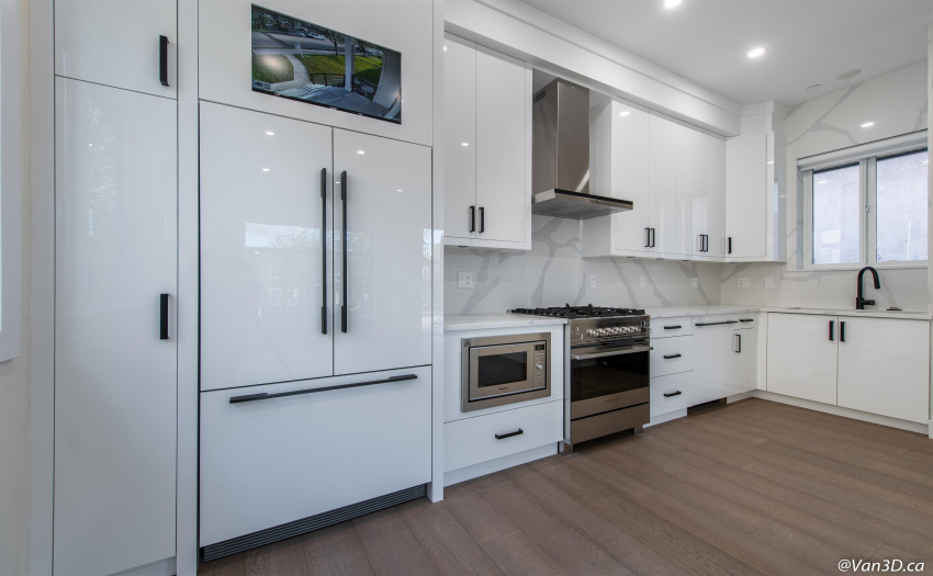 Built in high end Fisher & Paykel appliances with gas range, stone countertops, camera/security system, Nest thermostat, electric fireplace, and A/C.