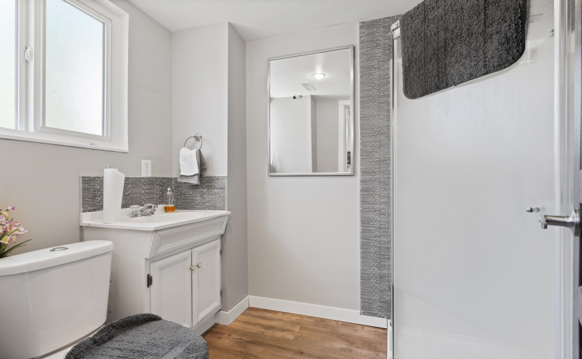 30. Downstairs bathroom with shower