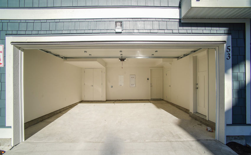 With a double garage and a room on the 1st floor, these townhomes boast practicality and comfort.