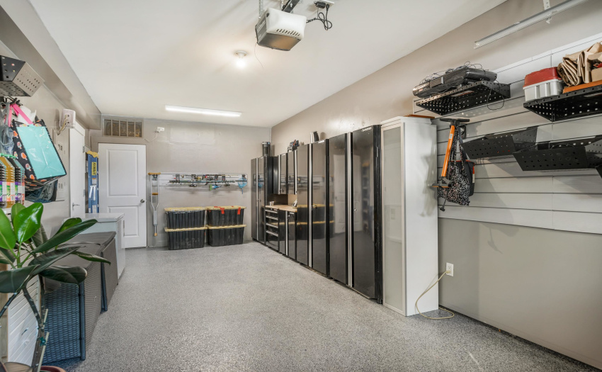 Coated floor, cabinets and racking storage system