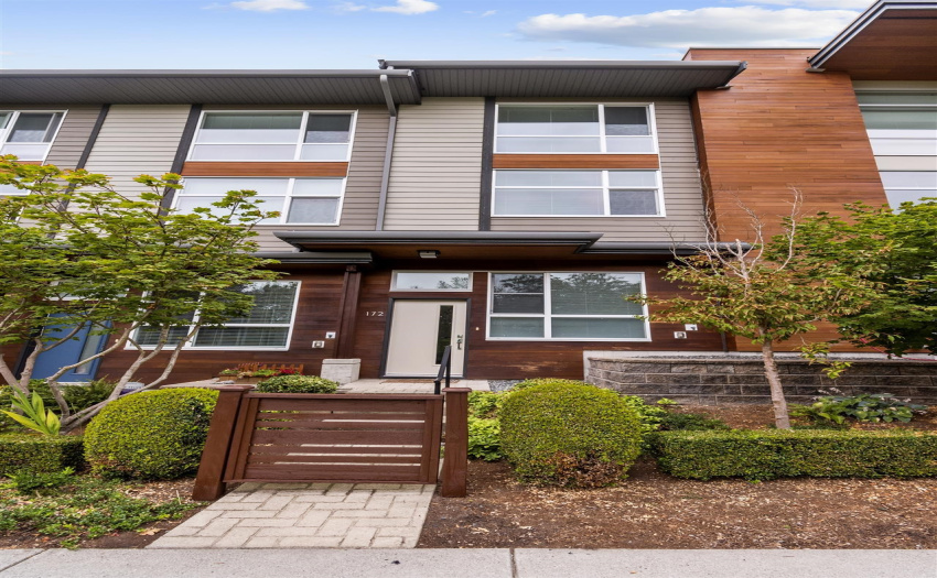 Unit is facing a quiet street with view of the green space