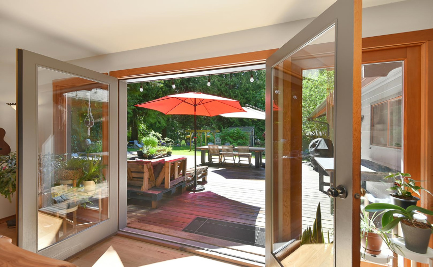 Double doors out to the expansive deck