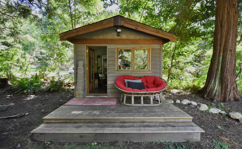 This is a cozy, yet large enough, space that is heated and wired for internet allowing you to work from home but not be in the house!