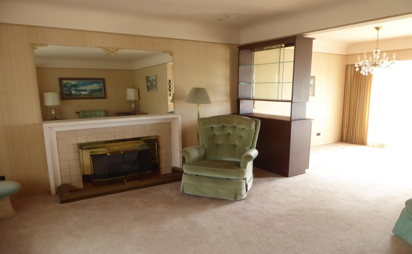 Spacious living room with wood fireplace