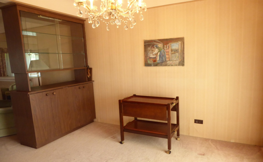Bright dining room with enclosed porch off