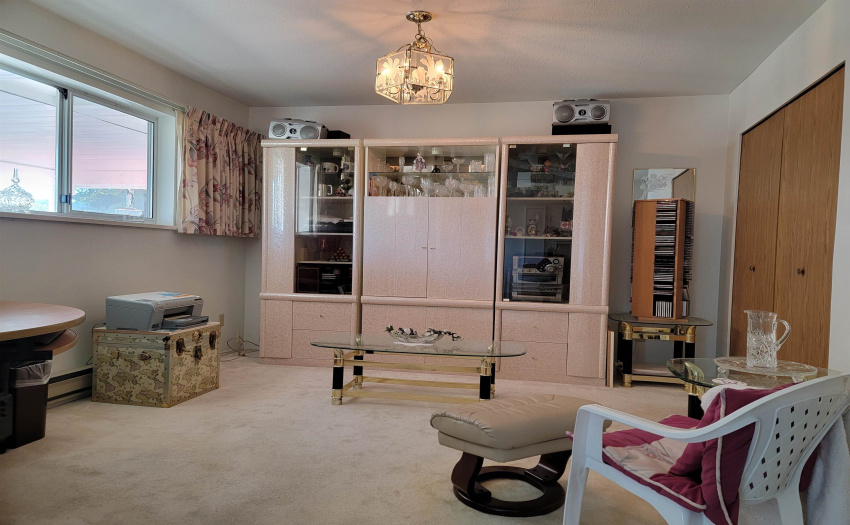 Currently used as a Media Room. This was originally the second bedroom. The wall could be reinstalled is a second bedroom is important.