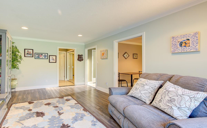 We love this family room! We can sit back on our favorite loveseat and read  books together or open the French Patio Doors to enjoy some fresh air in the morning as we sip our morning tea or coffee!