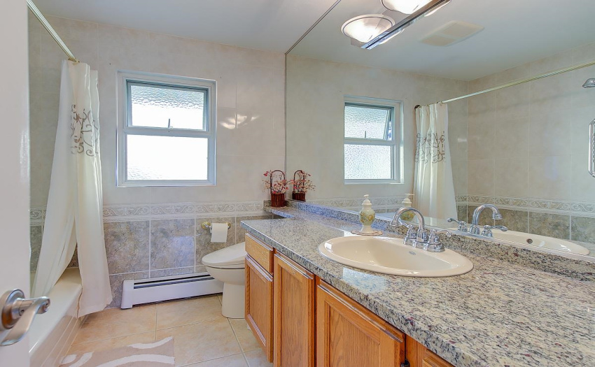 With Two Full Bathrooms upstairs and a Powder Room downstairs, combined with and a Hot Water Tank that was changed in 2019, you will have all the hot water for those long showers or baths!