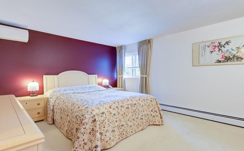 With a Daikin air conditioning that keeps the room at an even temperature with hot and cold functionality, as well as a baseboard heater, this master bedroom has a touch of elegance, comfort and class.