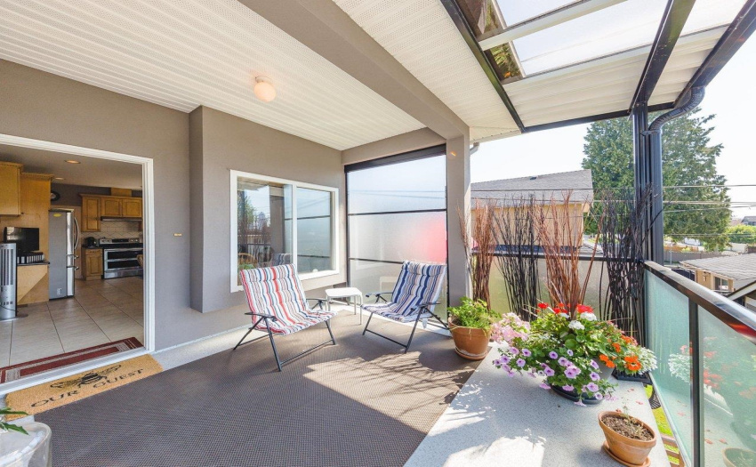 Spacious covered deck off the kitchen