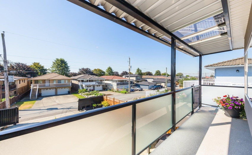 Spacious covered deck off the kitchen