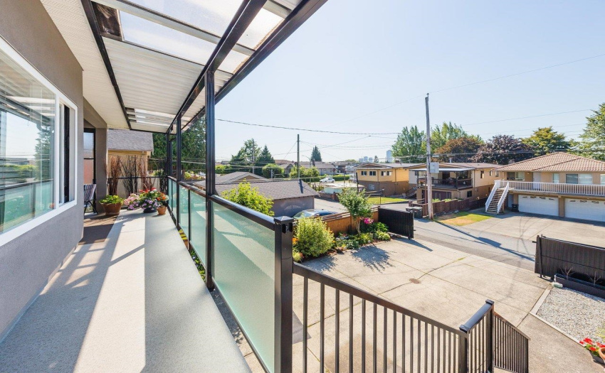 Spacious covered deck off the kitchen