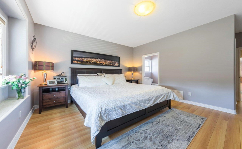 Spacious primary bedroom with private ensuite