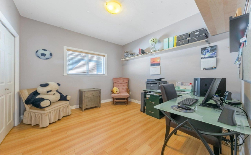One of two additional bedrooms on the main floor