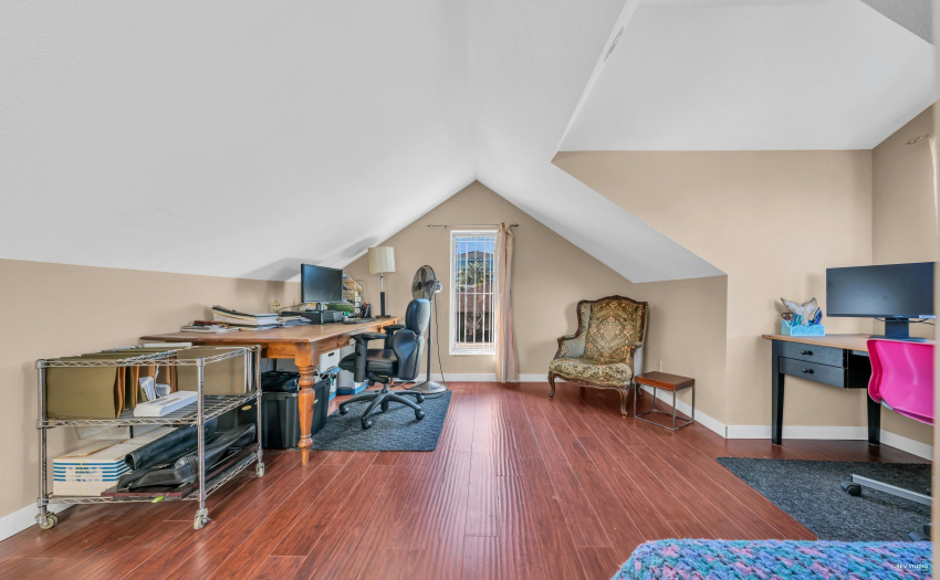 Loft bedroom currently used as office