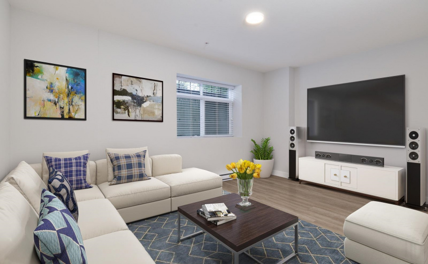 This room has a large window and heat. It could easily be a bedroom, media room or whatever you like