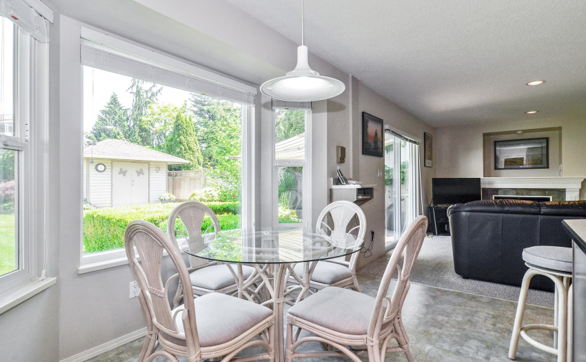 Your eating area overlooks that lovely back yard.