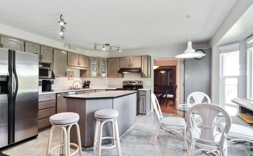 Open kitchen allows for ease of entertaining. Imagine friends and family gathered here.
