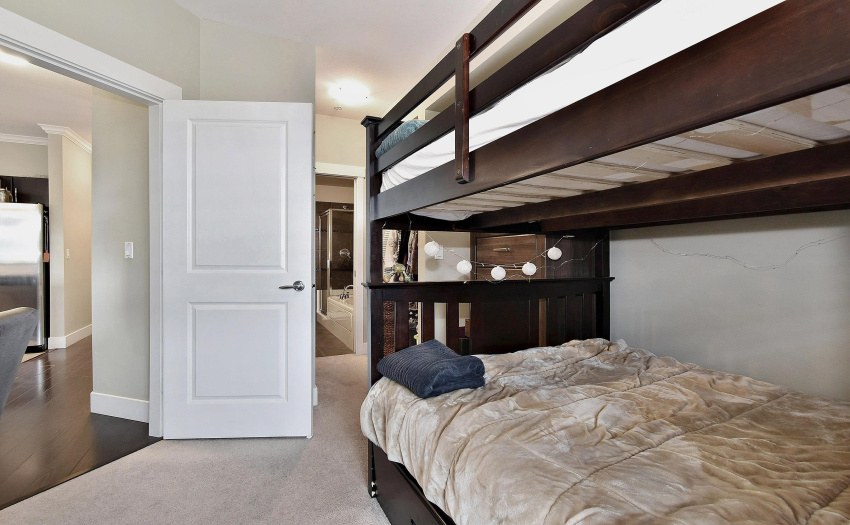 Access to the Primary bedroom from the living area, walk through closet and ensuite bath