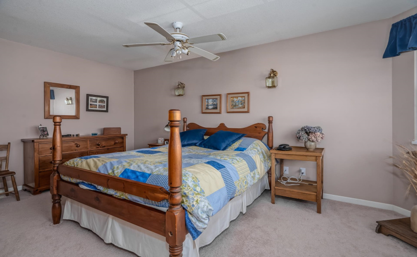 This primary suite has a large walk-in-closet and generous ensuite with a deep jetted soaker tub and separate shower.