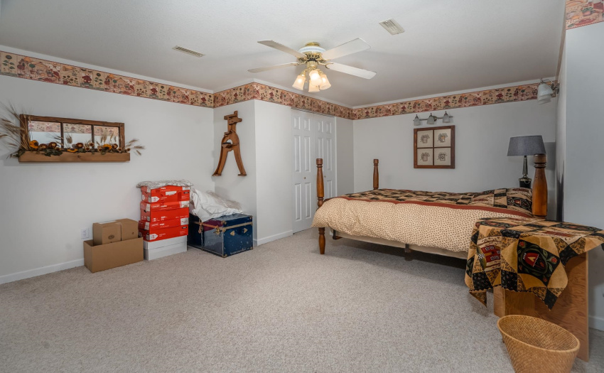 This room would make the perfect theatre room as there is no window to interfere with movie watching.