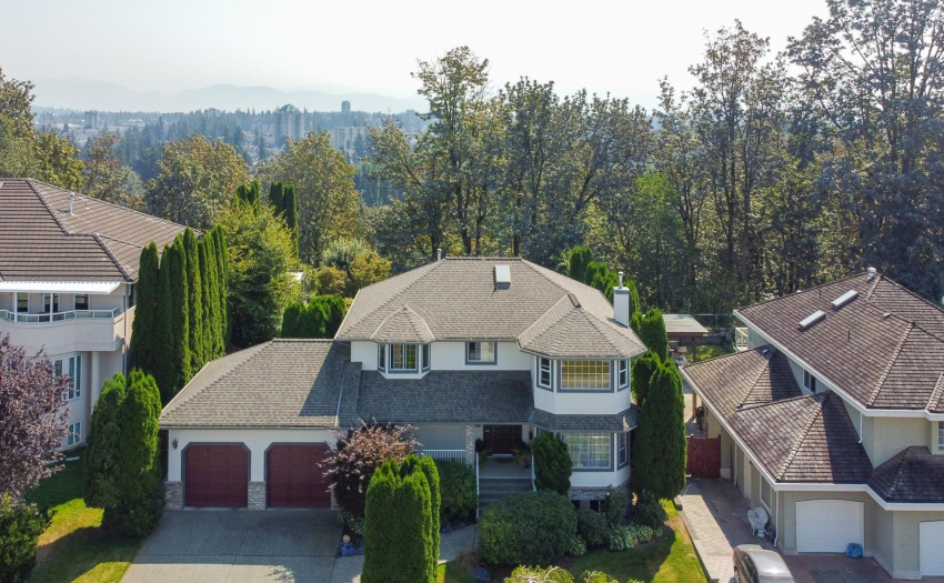 Aerial view of the front highlights the privacy of this large lot that backs onto park land - no houses behind you!