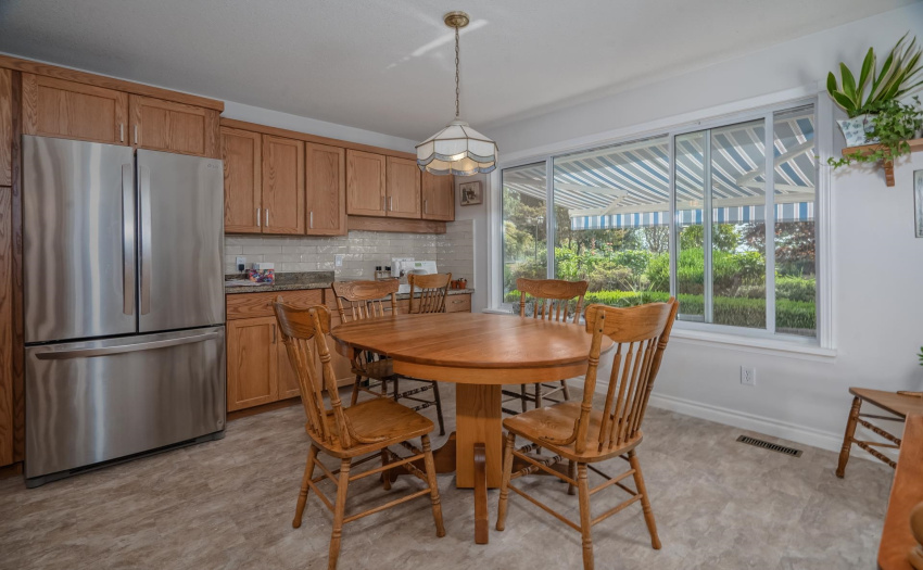 A whole wall of additional storage makes this an amazing kitchen for a large family.