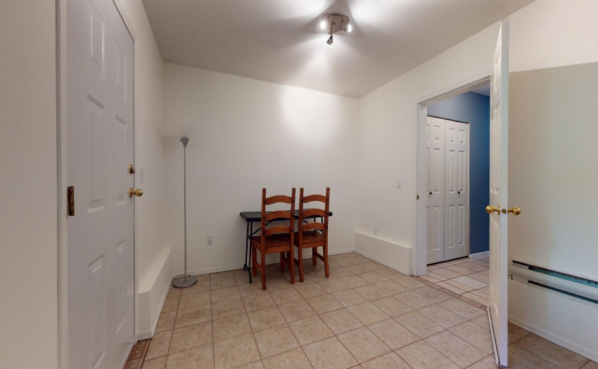 Mud room or could be a den or extra space for guests.
