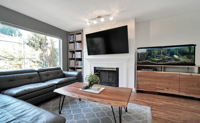 Large Living room with gas fireplace included in your strata fee.