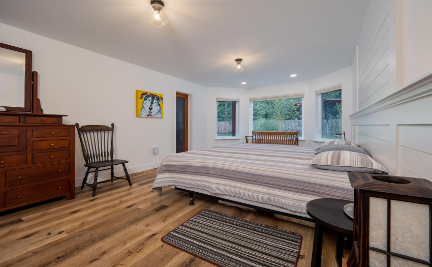 Escape at the end of the day to this serene bedroom on the main floor.  The space also includes a walk in closet and spacious spa like bathroom with more relaxing features...
