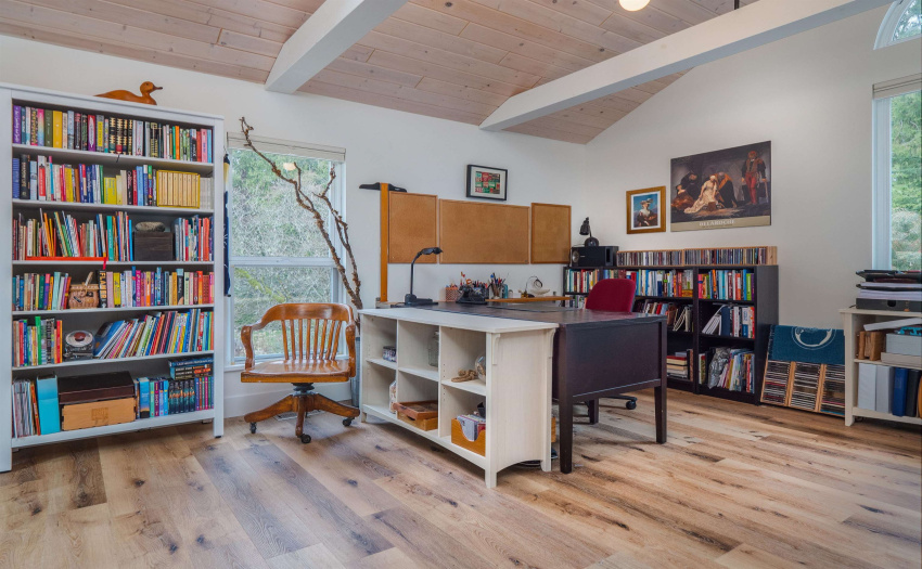 Currently used as an office retreat - this spacious room is bright with views to the front gardens and to the back forest.  It could also be converted back to a bedroom!  Great for children...or whatever your family can imagine!
