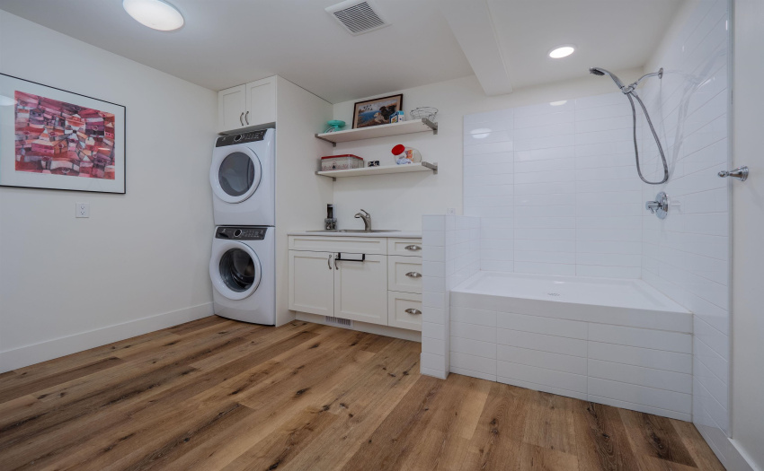 Spacious laundry room with dog shower!