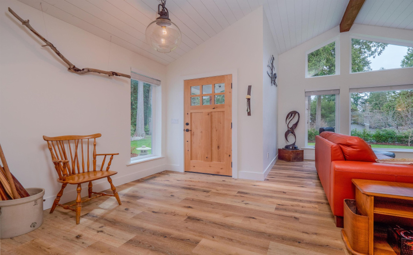 Entrance foyer to main home from the front access.  Alder wood door invites your guests into this relaxing home.