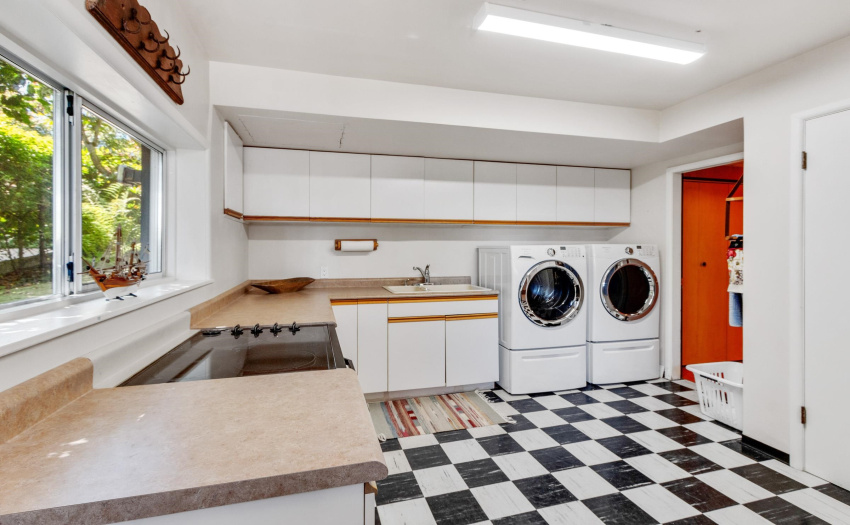 Huge Laundry Room with second fridge