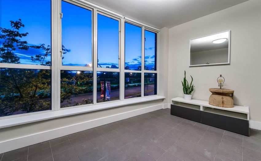 FILLED WITH NATURAL LIGHT. FLOOR TO CEILING WINDOWS