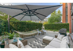Your own personal enormous patio, with private access through the gate to the quiet road. The benefits of a townhouse without the price tag or stairs!