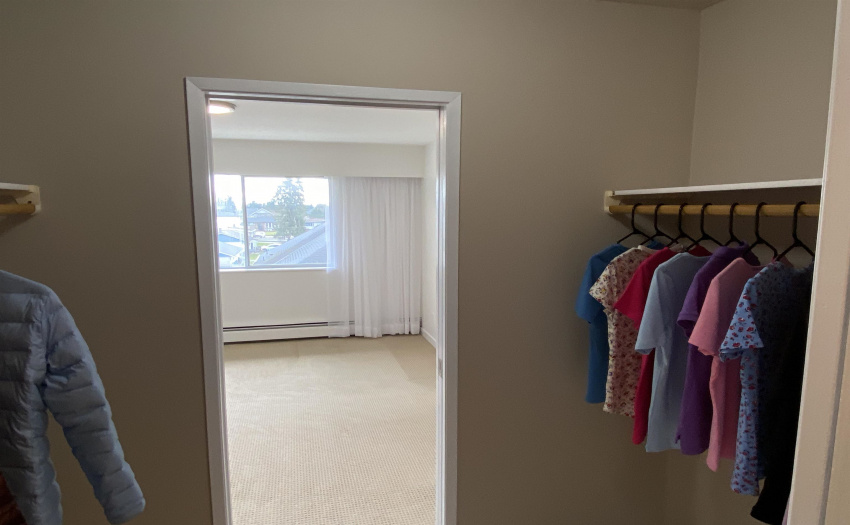 Walk Through Closet with cheater door to bathroom