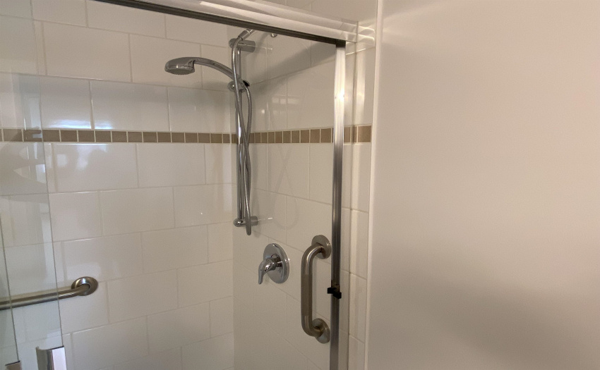 Updated Bathroom with walk in shower with assist handles