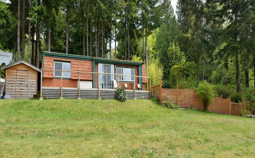 Looking at the home from the view area in the previous photo.  Small shed also belongs to this home.