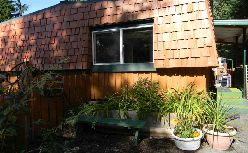 Cedar shingle siding makes for a cottage look.